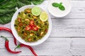 Palak Paneer Biryani and Raita at white background with decor. Palak Paneer Biryani is vegetarian indian cuisine dish