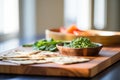 palak paneer served with a stack of chapatis on a wooden board Royalty Free Stock Photo