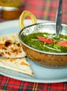 Palak paneer with tomatoes. Indian dishes