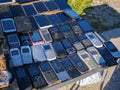 Old, used mobile phones for sale on the local market.