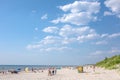 Palanga, Lithuania - Aug 03: People are relaxing on sandy beach of the Baltic sea. Seaside resort at warm summer day on Baltic sea