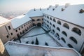 Palanok castle yard layered with snow Royalty Free Stock Photo