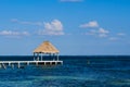 Palapa Hut and Dock on the Ocean Royalty Free Stock Photo