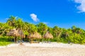 Palapa roof resort in tropical beach Playa del Carmen Mexico Royalty Free Stock Photo