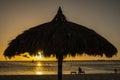 The palapa at sunset on Palm Beach Royalty Free Stock Photo