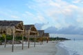 Palapas on a sandy beach of Gulf of Mexico Royalty Free Stock Photo