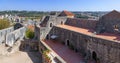 The Palatial Residence (Pacos Novos) on the right, and the ruins of the Nossa Senhora da Pena church on the left Royalty Free Stock Photo