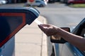 Palatine, IL/USA - 08-27-2020: A woman is safely and contactlessly mailing in her application for ballot for 2020 election at the