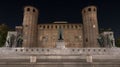 Palatine Towers at the back of Palazzo Madama in the centre of the town centre, photographed at night, Turin Italy