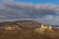 Palava panorama with Sirotci hradek and Devicky ruins. Winter view of limestone hills with Devin transmitter under a dramatic sky Royalty Free Stock Photo