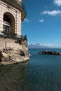 Detail of Palazzo Donn'Anna with Vesuvius in the background