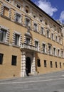 Palazzo Tantucci Palace facade from Piazza Salimbeni Square of Siena Medieval City. Tuscany. Italy Royalty Free Stock Photo