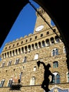 The Palazzo Vecchio in Florence, ITALY, view from the Loggia Lanzi with the sculpture "Perseus with Medusa's Head" Royalty Free Stock Photo