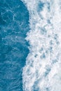 Pale blue sea wave during high summer tide, abstract ocean background