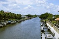 Pale blue sky over inter-coastal with docks and houses Royalty Free Stock Photo