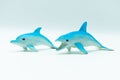 Pale blue and white Dolphins on white Royalty Free Stock Photo