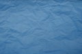 Blue crumpled paper texture background. Abstract pattern Royalty Free Stock Photo