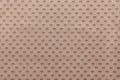 Pale brown fabric with spots ovals