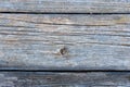 Pale faded brown and cool blue reclaimed pine wood surface with aged boards lined up. Weathered wooden planks on a wall Royalty Free Stock Photo