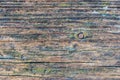 Pale faded brown and cool blue reclaimed pine wood surface with aged boards lined up. Weathered wooden planks on a wall Royalty Free Stock Photo