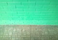 Pale green symmetric street brick wall background