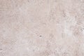 Pale marsala plastered wall background