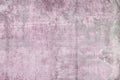 Pale pink abstract background with spots and bumps. Closeup sheet texture of an old slate. The basis for advertising