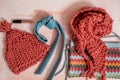 Pale pink gloves, scarf and woolen hat woman winter set on white background Royalty Free Stock Photo