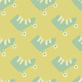 Pale seamless pattern with roller doodle ornament. Blue shoes silhouettes on yellow background Royalty Free Stock Photo