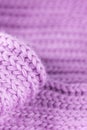 Pale soft violet purple pink knitted wool texture. Close up wool background. Warm and cozy. Blurred delicate background Royalty Free Stock Photo