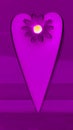 A silk flower on a violet heart.