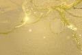 Pale yellow and gold marble texture with sparkles Royalty Free Stock Photo