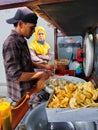 Portrait of people, selling Indonesian snacks siomay batagor bandung in Palembang. indonesia indonesian