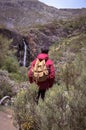 Palencia. Young man contemplating the mazobre waterfall. Spain Royalty Free Stock Photo