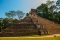 Palenque, Chiapas, Mexico: Huge ancient pyramid with steps in the archaeological complex. Royalty Free Stock Photo