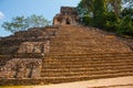 Palenque, Chiapas, Mexico: Huge ancient pyramid with steps in the archaeological complex. Royalty Free Stock Photo