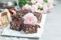 Paleo chocolate energy bars with rolled oats, pecan nuts, dates, chia seeds and coconut flakes, copy space Royalty Free Stock Photo