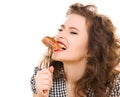 Paleo diet concept - woman eating meat