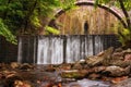 Paleokarya, old, stone, arched bridge, between two waterfalls. Trikala prefecture, Thessaly, Greece