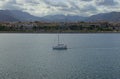 Picturesque panoramic landscape of ancient Palermo. View from the sea. Mountain range in the background against vibrant sky