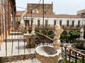 Palermo, Sicily, Italy - April 15, 2022: The statue fountains with angels in courtyard of the Santa Caterina church, Palermo,