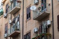 Palermo, Sicily, Italy - Balconies of a residential apartment block with airco and parabolic antennas