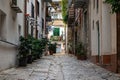 Palermo, Sicily, Italy - Low angle view over narrow cobble stone alley