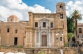 View of Bellini Square with tourists visiting the Santa Maria dell`Ammiraglio Church known as Martorana Church in the center of Pa