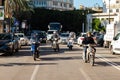 Palermo, Sicily, Italy - Scooters and motor cyclists driving near the railway station on a bussy road