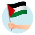 palestine flag in hand