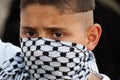 Palestinian Boy with Keffiyeh Mask