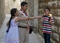 Palestinian children holds candeles