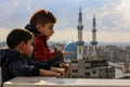 Palestinian children look at the Egyptian border