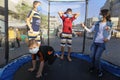 Palestinian children play on the second day of Eid Al-Fitr, near their homes, due to the closure of amusement parks and public par